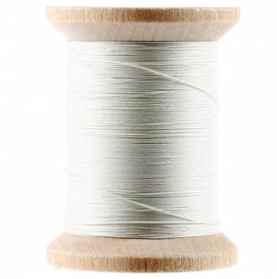 100% Extra Long Staple Glazed Finish Egyptian Cotton in White or Natural YLI Hand Quilting 100% Extra Long Staple Glazed Finish Egyptian Cotton in White or Natural YLI Hand Quilting