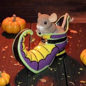 May include: A handmade wooden serving tray with a natural finish. The rectangular tray has raised edges and integrated handles. The wood grain is visible, showcasing its rustic charm. Dimensions are approx. 40 cm long, 25 cm wide, and 5 cm high.