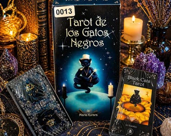 May include: A tarot card set with a black cat illustration, labelled "Tarot de los Gatos Negros". The set includes a box and two decks, with a mystical theme. Candles and decorative items surround the tarot cards.