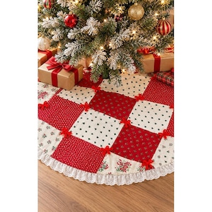 May include: A round Christmas tree skirt featuring a patchwork design of red and cream fabric squares with floral and pine tree patterns. The skirt is accented with small red fabric bows at the corners and finished with a white lace trim.