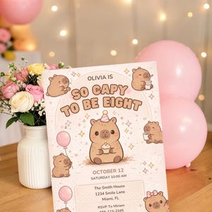 May include: A birthday invitation with the text "Olivia is So Capy to be Eight" and cute cartoon capybaras. The invitation includes the date, time, and location: The Smith House, Miami, FL. Pink balloons and flowers are in the background.