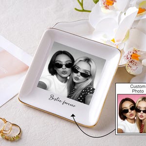 May include: A handmade wooden sign with the text "Welcome" in a playful font. The sign features a distressed white background and a dark brown frame, perfect for a front door or entryway. The sign measures approximately 12 inches wide and 6 inches tall.