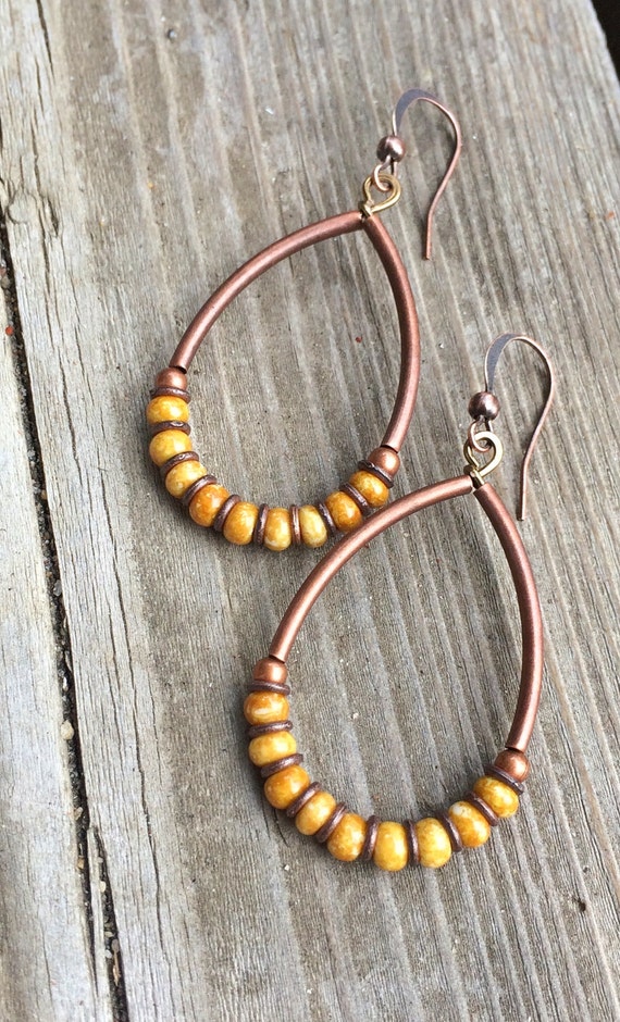 Items similar to Mustard Yellow Boho Hoop Earrings with Antiqued Copper