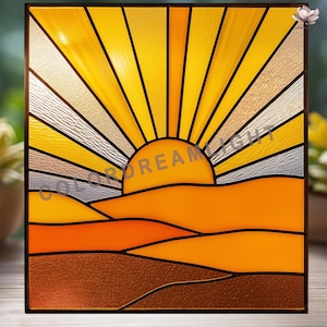 May include: Stained glass panel depicting a sunset. The artwork features a bright sun with yellow and gold rays, above a landscape of orange and brown hills. The text "COLOR DREAM LIGHT" is visible.