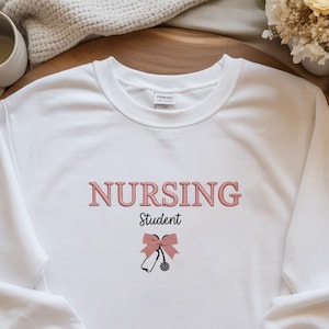 Nursing Student Embroidered Sweatshirt, Cute Stethoscope Bow Crewneck, Nursing School Gift, Cozy Future Nurse Apparel