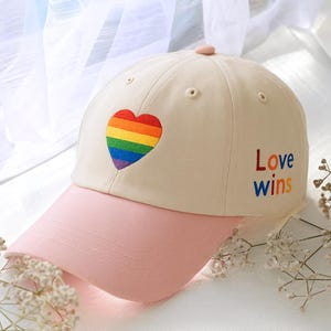 Love Wins Rainbow Heart Baseball Cap, Support LGBTQ+ Hat, Pride Month Cap, Lesbian Pride Hat, Gay Pride Hat, Rainbow Pride Flag Hat