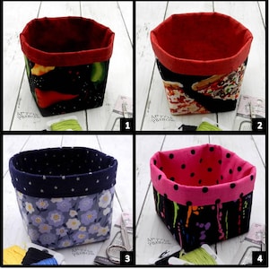 May include: A set of four fabric storage bins. Bin 1 features a black exterior with chili peppers and a red interior. Bin 2 has a pizza print exterior and a red interior. Bin 3 shows a light purple floral print with a navy star interior. Bin 4 has a black paint drip print with a pink polka dot interior.