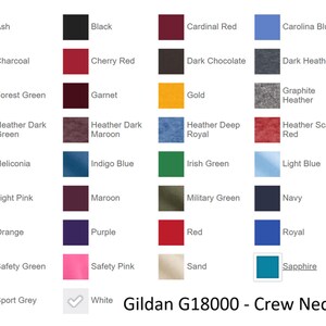 May include: A color chart displaying a variety of hues for Gildan G18000 crew neck apparel. Colors include Ash, Black, Charcoal, Cherry Red, Forest Green, and many more. The text "Gildan G18000 - Crew Neck" is at the bottom.