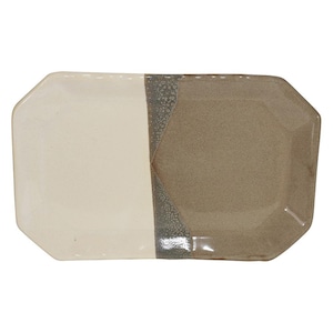 May include: A rectangular serving tray with a white and brown glaze. The tray has a slightly irregular shape with rounded corners.