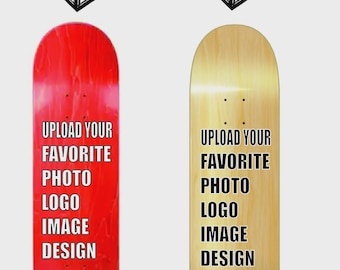 May include: Two skateboard decks, one red and one natural wood, with the text "YOUR DESIGN HERE" above them. Each deck has the text "UPLOAD YOUR FAVORITE PHOTO LOGO IMAGE DESIGN" in black.
