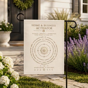 May include: A beige garden flag with the text "HOME & BUSINESS ACTIVATOR" and a circular design. The flag is displayed on a black metal stand in a garden setting. The flag's design includes the words "ELEVATE PROTECT HARMONIZE YOUR SPACE & YOUR LIFE."