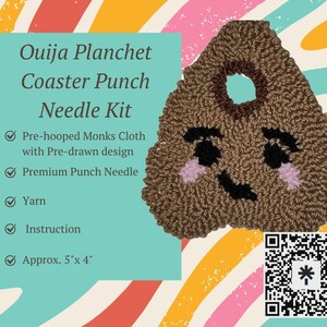 May include: A brown Ouija Planchet Coaster Punch Needle Kit with a smiling face design. The kit includes pre-hooped Monks Cloth, premium punch needle, yarn, and instructions. The coaster measures approximately 5" x 4".