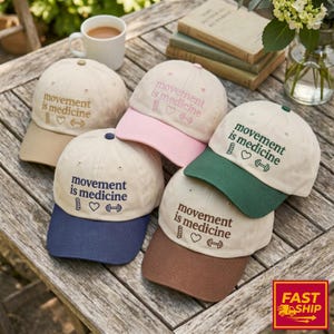 Embroidered Movement is Medicine Trucker Hat