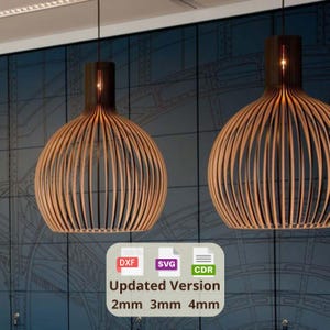 May include: Two wooden pendant lights with a spherical design, suspended from the ceiling. The lamps have a dark brown top and a light brown, slatted body. The image includes the text "Updated Version" and file type icons.