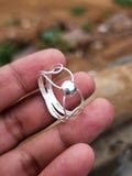Handmade Sterling Silver Ball Ring: Adjustable Boho Wire Ring product logo