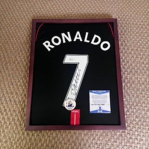 CR7 Signed Black Away Jersey with Beckett COA - Frame Optional