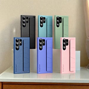 リストストラップ レザーグリップ スマホケース マット 保護カバー フィンガーストラップ付き Samsung S22 S23 S24 S25 Plus Ultra用