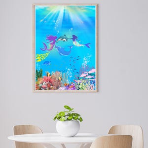 May include: A framed print featuring an underwater scene with mermaids and dolphins. The artwork depicts two mermaids with purple and silver hair, and a third with black hair, swimming with dolphins. The scene includes colorful coral and fish.