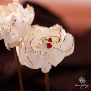 May include: A rustic wooden sign with the text "Welcome to our home" in white lettering. The sign features a distressed finish and a simple, inviting design, perfect for entryway decor.