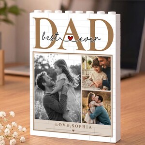 May include: A white brick-style photo block with the word "DAD" in brown letters. The block features three family photos and the text "best ever" with a heart. The bottom of the block reads "LOVE, SOPHIA".
