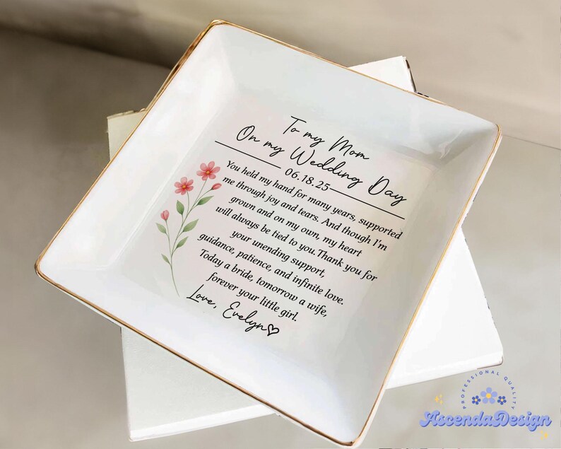 May include: White ceramic trinket dish with gold trim, featuring a heartfelt message to a mother on her wedding day. The dish includes a floral design and the text "To my Mom, On my Wedding Day".