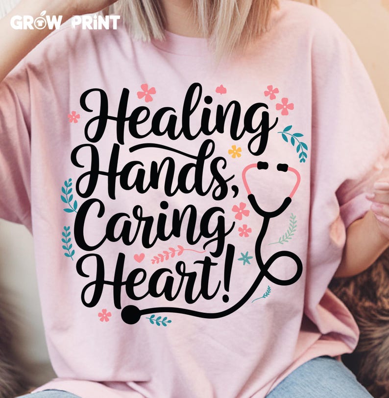 May include: Pink t-shirt with a floral design and the text "Healing Hands, Caring Heart!" with a stethoscope graphic.