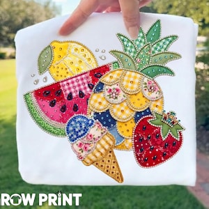 May include: White fabric with a colorful, embroidered design of summer fruits and an ice cream cone. The design includes a watermelon slice, lemon, pineapple, and strawberry, all embellished with beads. The text "GROW PRINT" is at the bottom.