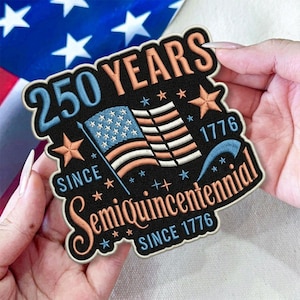 May include: Embroidered patch with the text "250 YEARS SINCE Semiquincentennial SINCE 1776". The patch features an American flag design in blue, white, and orange, with stars and stripes. The patch is black with an orange border.