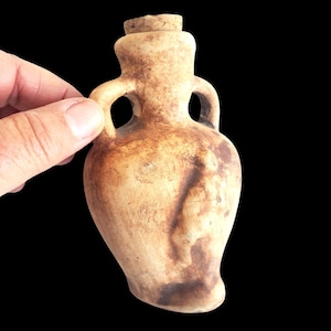 Miniature Amphora Vase With Woman Figure Lifting Skirt to Show Behind Anasyrma