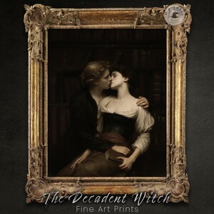 May include: A framed fine art print featuring a romantic scene of two people kissing. The artwork is set in a library, with the figures in period clothing. The frame is ornate, gold-colored, and the print is from "The Decadent Witch."