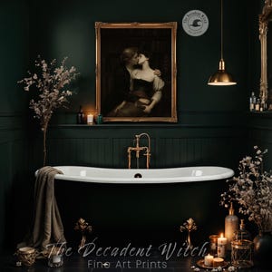 May include: A luxurious bathroom with a white bathtub, gold fixtures, and a framed painting. The walls are dark green, and the room is decorated with candles, flowers, and a pendant light. The text "The Decadent Witch Fine Art Prints" is visible.