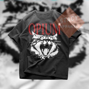 May include: Dark gray t-shirt featuring the word "OPIUM" in red above a white, roaring cat graphic. The shirt has a crew neck and short sleeves. The Stacy Apparel logo is visible in the upper right corner.