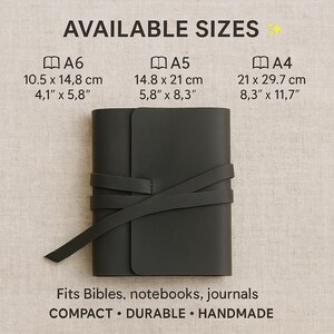 May include: A black leather journal with a wrap-around closure. The journal is available in three sizes: A6 (4.1" x 5.8"), A5 (5.8" x 8.3"), and A4 (8.3" x 11.7"). The text "Fits Bibles, notebooks, journals" and "COMPACT DURABLE HANDMADE" is printed below the journal.