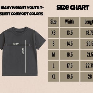 May include: A dark grey youth t-shirt with a size chart. The chart lists sizes XS to XL, with corresponding width and length measurements in inches. The text "HEAVYWEIGHT YOUTH T-SHIRT COMFORT COLORS" is at the top.