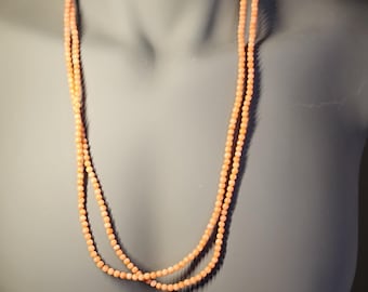 Luxurious Angel Skin Coral Necklace. Can be worn doubled up as it is 63" circumference. Absolutely gorgeous Necklace.