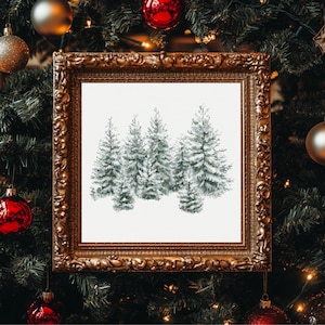 May include: A framed watercolor painting of snow-covered evergreen trees. The artwork is displayed in a gold ornate frame, set against a backdrop of a decorated Christmas tree with ornaments and lights.