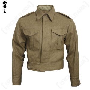 May include: A tan wool jacket with two front pockets, a collar, and a buckle at the waist. The jacket has long sleeves and epaulets on the shoulders. The jacket is a military style.