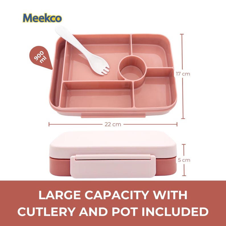 May include: A pink divided lunch box with a white fork, measuring 22 cm long, 17 cm wide, and 5 cm high. The lunch box has a capacity of 900 ml and includes a pot and cutlery. The text "LARGE CAPACITY WITH CUTLERY AND POT INCLUDED" is displayed.