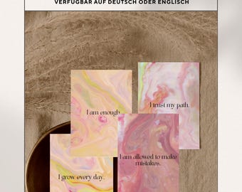 May include: A set of affirmation cards with abstract, colourful designs in pink, yellow, and green. Each card has a positive affirmation like "I am enough" and "I trust my path." The text "50 DRUCKBARE AFFIRMATIONSKARTEN VERFÜGBAR AUF DEUTSCH ODER ENGLISCH" is displayed at the top.