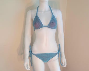 Blue mesh over red bikini