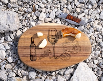 Engraved wooden board for wine and cheese