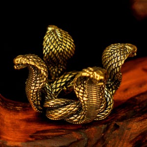 Solid Brass Four-Headed Cobra Sculpture – Mythical Serpent Figurine for Shelf or Altar Decor