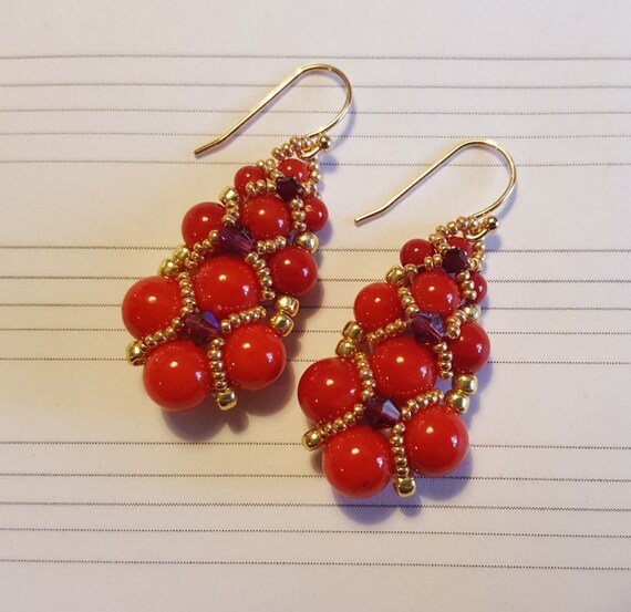 Items similar to Red beaded earrings, red pearls, red chandelier