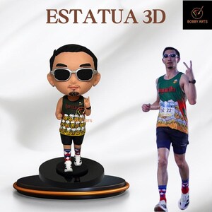 May include: A 3D figurine of a man wearing sunglasses, a black tank top with a beer-themed design, and black shorts. The figurine is on a black and orange base. The image also shows a man in a running outfit.
