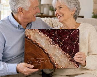May include: A rectangular wooden plaque featuring a deep burgundy marble-effect section, a central band of textured gold and white crystalline detail, and a natural wood grain side. The text reads 40TH ANNIVERSARY Jessica & David EST. 1986.