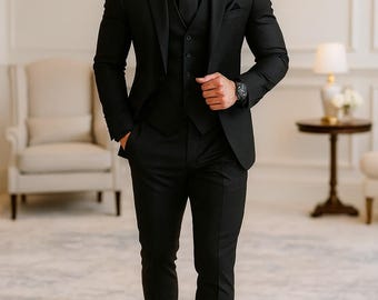 May include: A black three-piece suit, including a jacket, vest, and trousers, paired with a black dress shirt and tie. The suit is worn with black leather shoes. The outfit is a formal ensemble, suitable for business or special occasions.