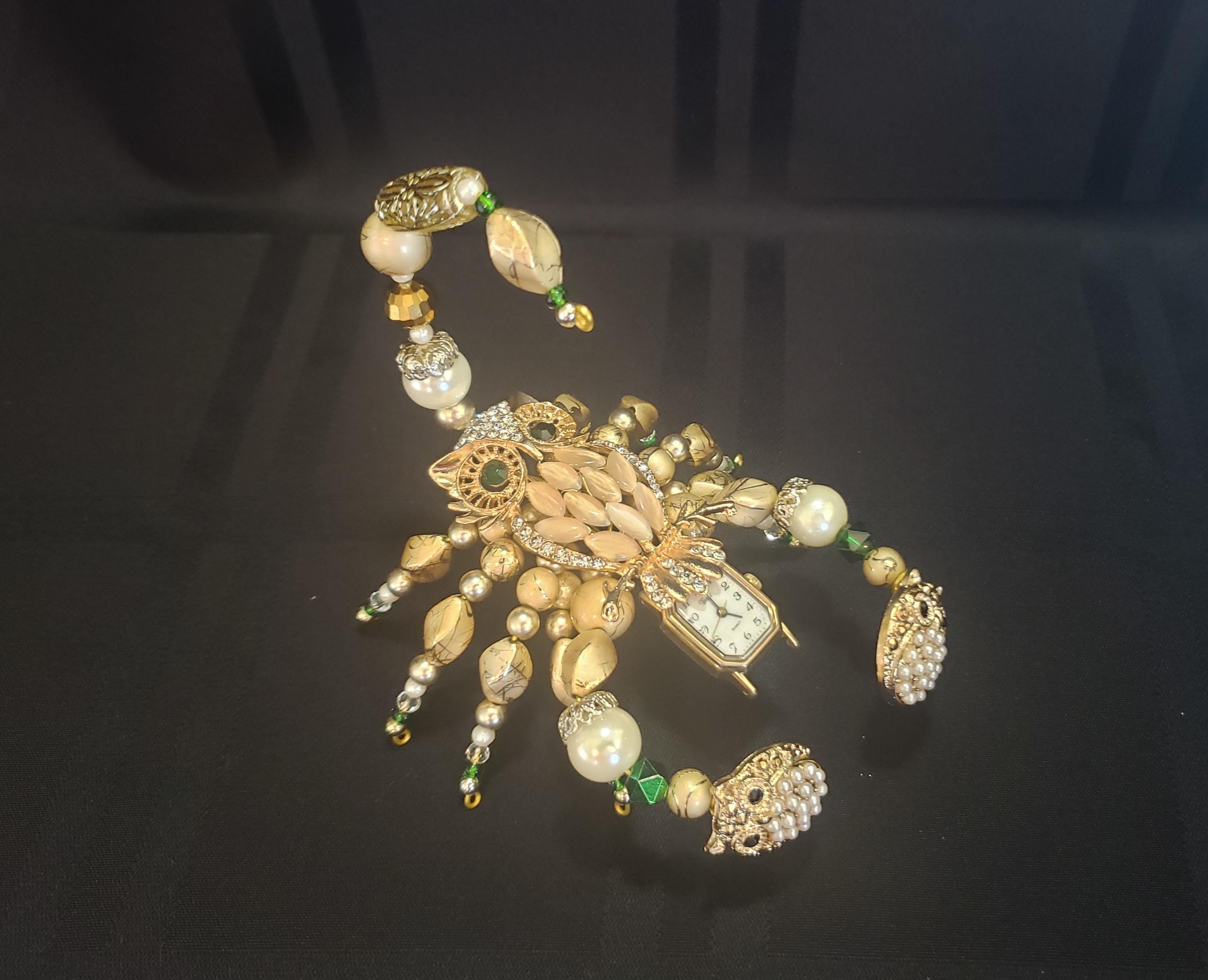 Gold and Emerald Owl Scorpion