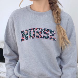Custom Nurse Sweatshirt, Nursing Sweatshirt, Floral Nurse Crewneck, Nurse Sweater, RN Shirt, Nurse Graduation Gift, Nurse Appreciation Gift