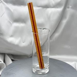 May include: A rustic wooden sign with the text "Welcome to our home" in a handwritten style. The sign features a distressed finish and a simple, inviting design, perfect for a front porch or entryway.