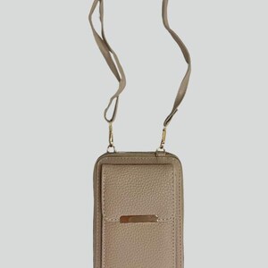 Bolso bandolera negro para teléfono: pequeño monedero de piel sintética con ranuras para tarjetas, cierre de cremallera y correa ajustable.